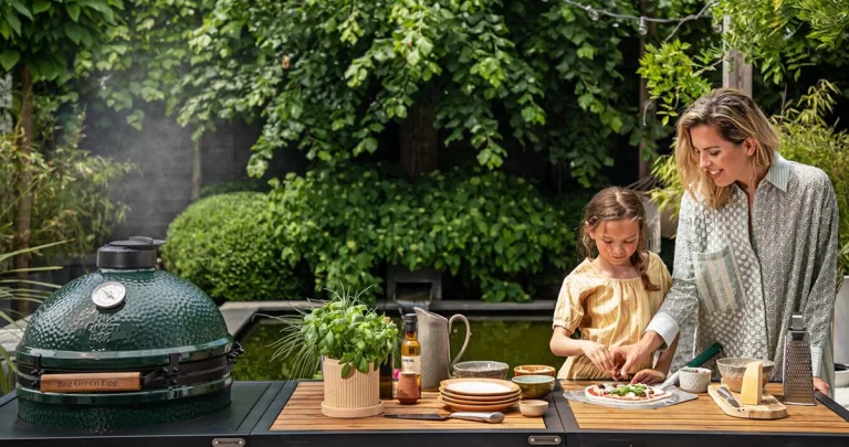 Mother teaching daughter about grill and firepit safety